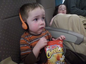 Ahh, junk food, the universal soother. Despite the worried look, he was quiet content - 