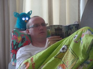 Rainy Day Read In ... our new pet, Furby, is enjoying the Prisoner of Azkaban.