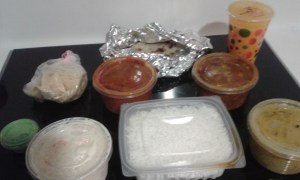 Bam...Indian food delivered in under an hour to our door by a man on scooter. City living at it's  best ... a mama could get used to this!